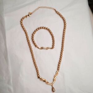 Faux pearl ans diamond necklace and bracelet set  gold